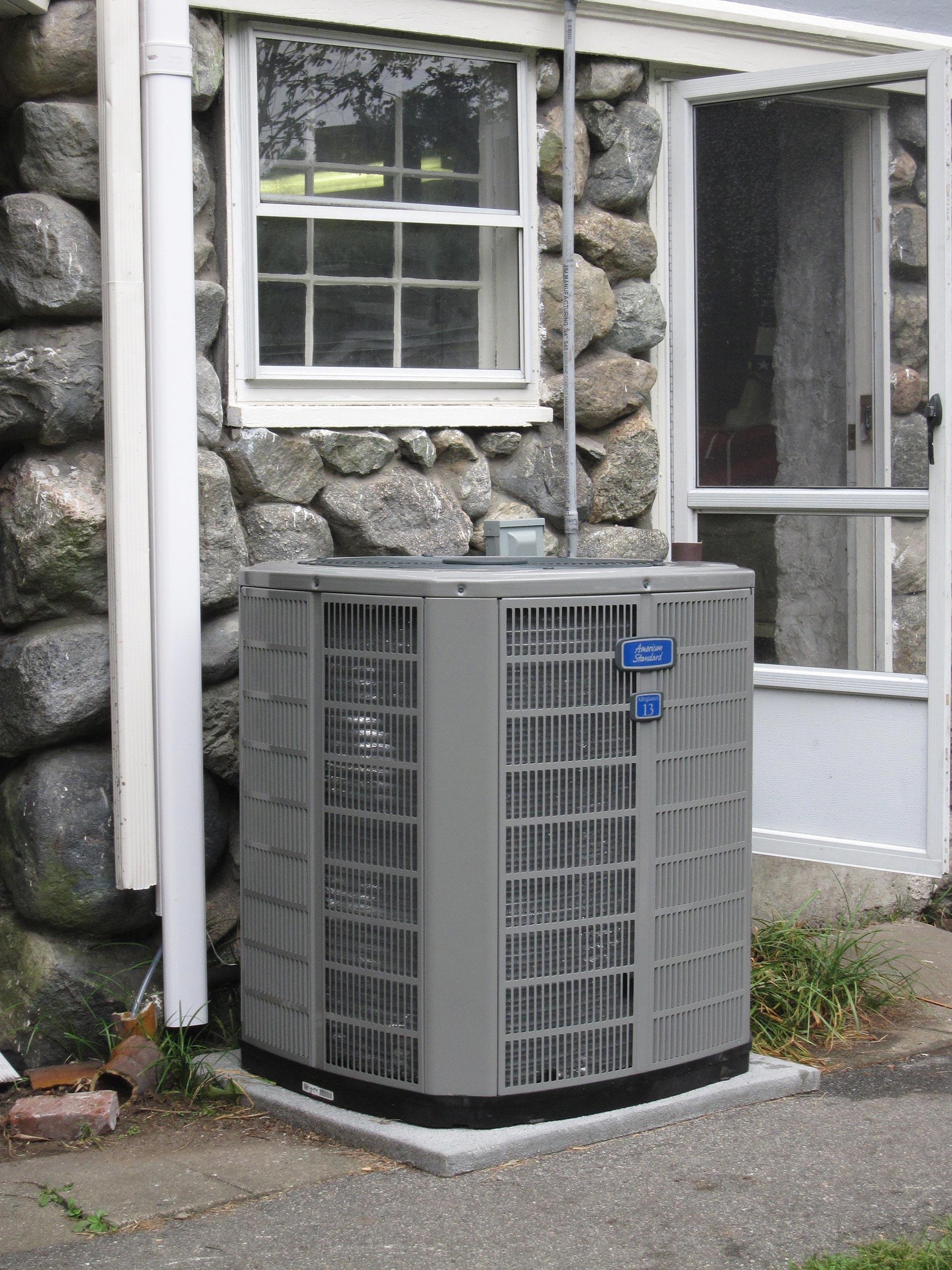 Floor Mounted High Eff FHW Gas Boiler with Indirect HW Tank and Unico High Velocity AC System